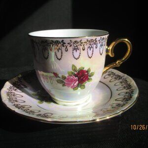 Czecho Porcelain Teacup and Saucer. Lusterware.